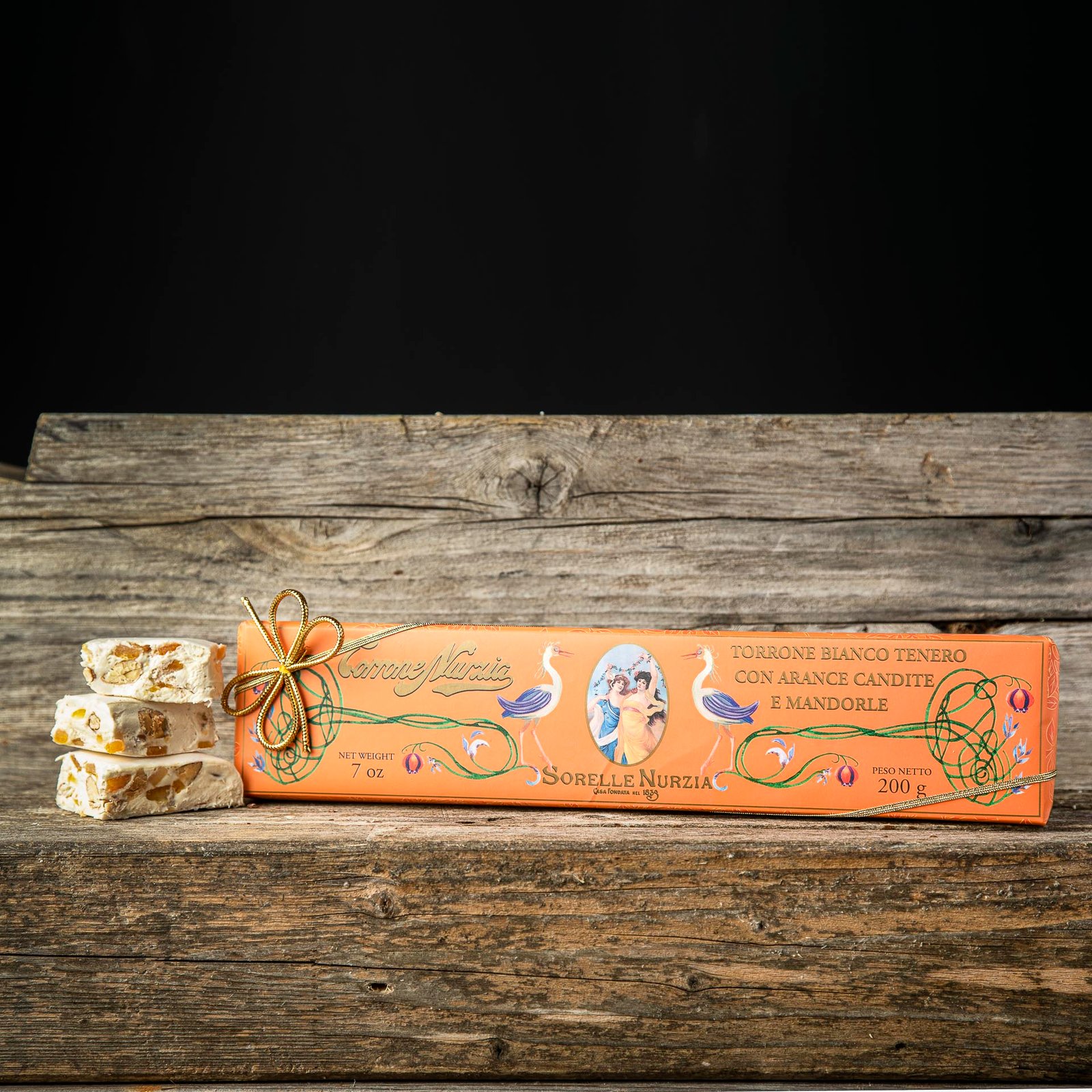 TORRONE BIANCO TENERO CON MANDORLE E ARANCE CANDITE – STECCA DA 200g – INCARTO A MANO